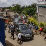 POPE RETURNS Frail Pope Francis waves from hospital window to cheering crowd as he’s released after nearly dying from pneumonia