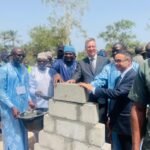 MINISTER PRESENTS FLAG TO BABY SCORPIONS AT SEND OFF